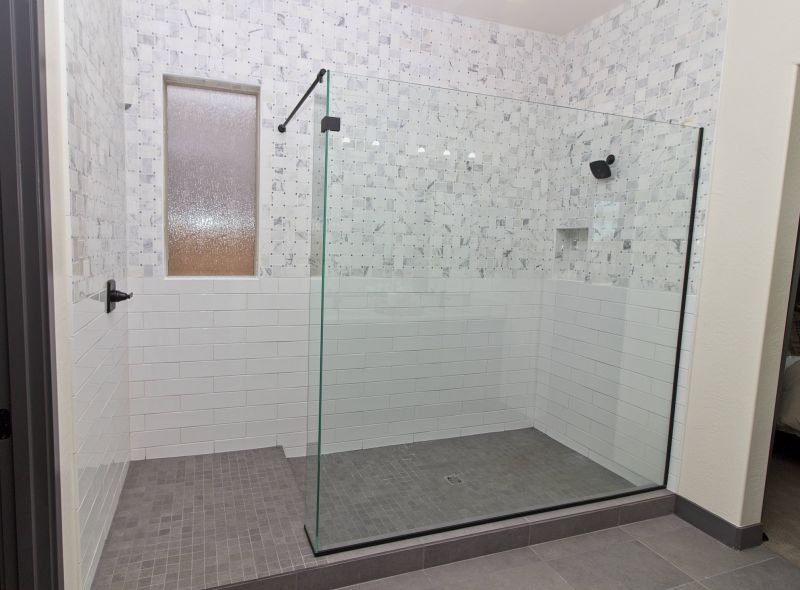Modern shower with geometric tile patterns